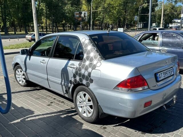Сірий Міцубісі Lancer, об'ємом двигуна 1.6 л та пробігом 460 тис. км за 3200 $, фото 3 на Automoto.ua