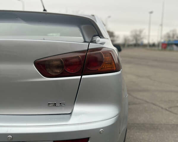 Серый Мицубиси Лансер, объемом двигателя 2 л и пробегом 286 тыс. км за 5800 $, фото 16 на Automoto.ua