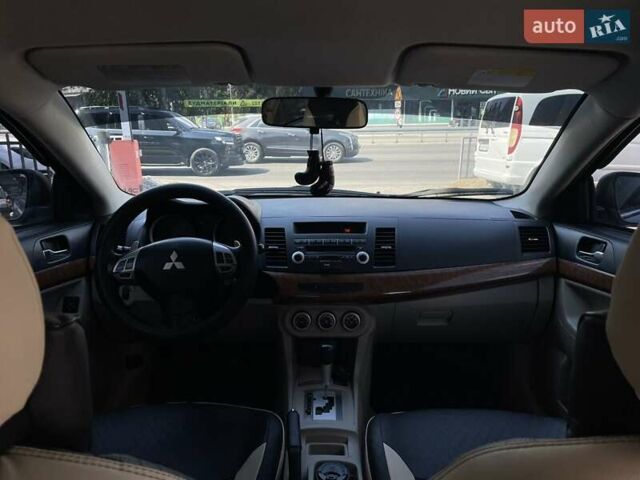 Сірий Міцубісі Lancer, об'ємом двигуна 2 л та пробігом 203 тис. км за 6999 $, фото 17 на Automoto.ua