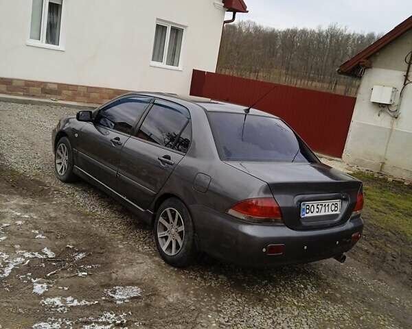 Сірий Міцубісі Lancer, об'ємом двигуна 1.6 л та пробігом 337 тис. км за 4600 $, фото 12 на Automoto.ua