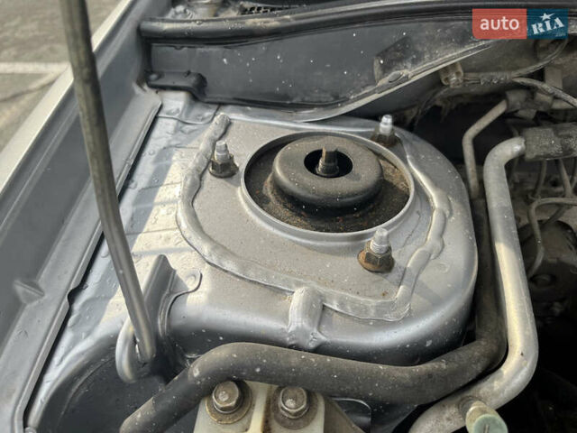 Серый Мицубиси Лансер, объемом двигателя 1.58 л и пробегом 232 тыс. км за 4900 $, фото 31 на Automoto.ua