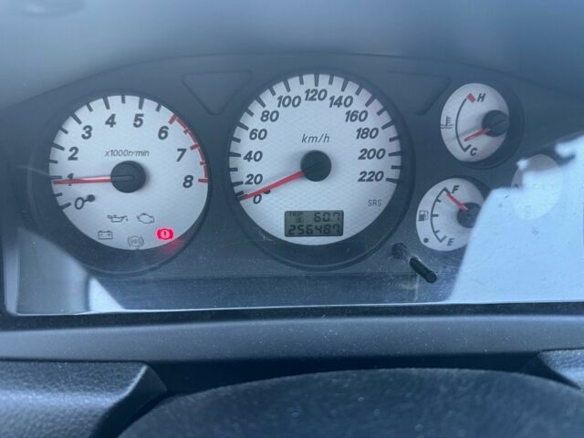 Серый Мицубиси Лансер, объемом двигателя 1.6 л и пробегом 256 тыс. км за 4500 $, фото 8 на Automoto.ua