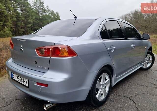 Серый Мицубиси Лансер, объемом двигателя 2 л и пробегом 213 тыс. км за 6550 $, фото 2 на Automoto.ua
