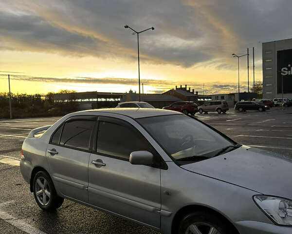 Міцубісі Lancer 2007 у Чернівцях на Automoto.ua Сірий Міцубісі Lancer, об'ємом двигуна 1.6 л та пробігом 171 тис. км за 4500 $, фото 1 на Automoto.ua