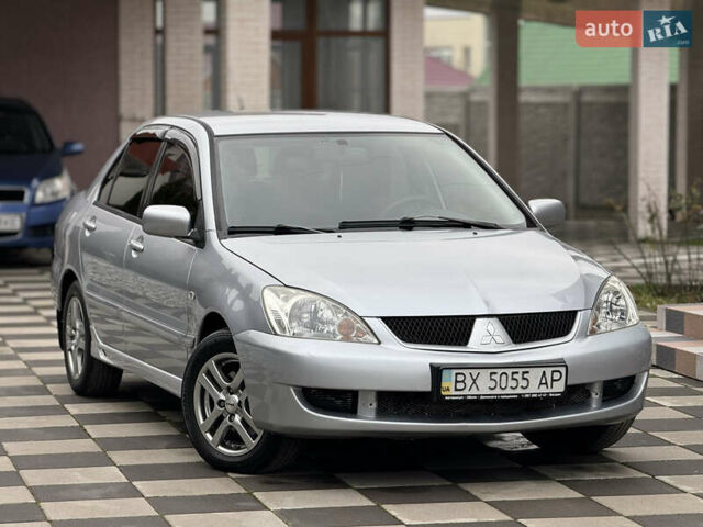 Сірий Міцубісі Lancer, об'ємом двигуна 1.6 л та пробігом 281 тис. км за 3999 $, фото 1 на Automoto.ua