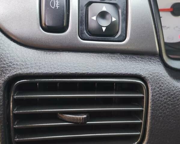 Сірий Міцубісі Lancer, об'ємом двигуна 1.58 л та пробігом 122 тис. км за 6300 $, фото 42 на Automoto.ua