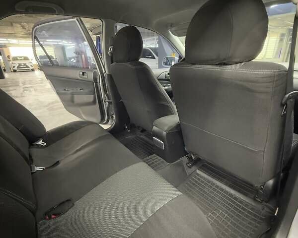 Серый Мицубиси Лансер, объемом двигателя 1.58 л и пробегом 271 тыс. км за 4200 $, фото 32 на Automoto.ua