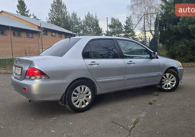 Сірий Міцубісі Lancer, об'ємом двигуна 1.6 л та пробігом 213 тис. км за 3600 $, фото 11 на Automoto.ua