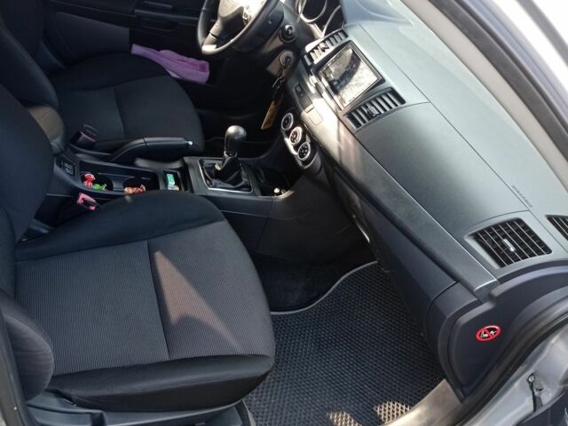 Серый Мицубиси Лансер, объемом двигателя 2 л и пробегом 180 тыс. км за 5800 $, фото 15 на Automoto.ua