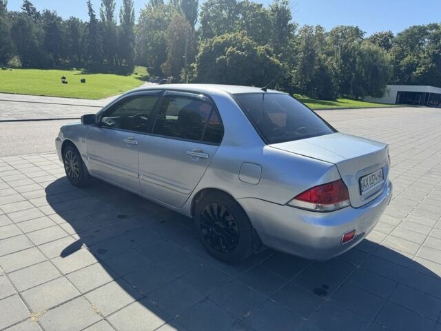 Серый Мицубиси Лансер, объемом двигателя 1.6 л и пробегом 265 тыс. км за 4100 $, фото 5 на Automoto.ua