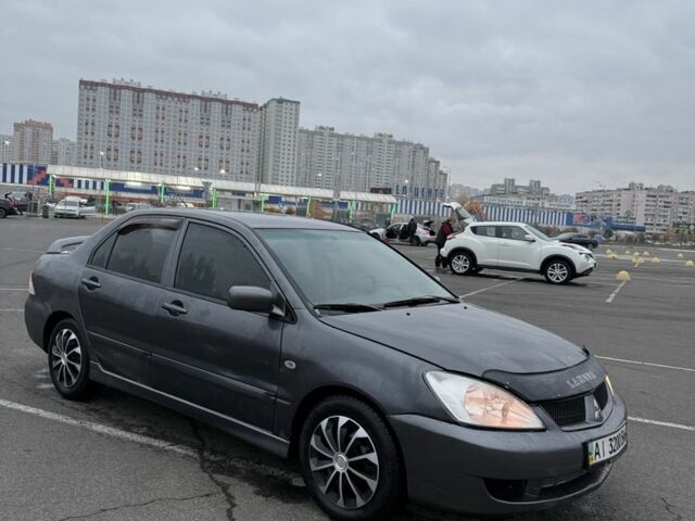 Серый Мицубиси Лансер, объемом двигателя 1.6 л и пробегом 350 тыс. км за 2850 $, фото 11 на Automoto.ua