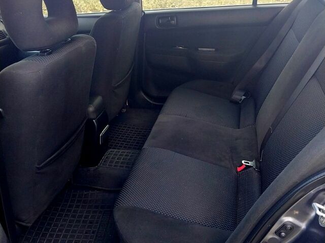 Сірий Міцубісі Lancer, об'ємом двигуна 1.6 л та пробігом 229 тис. км за 4500 $, фото 9 на Automoto.ua