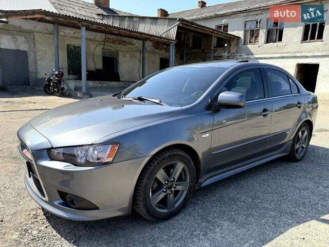 Сірий Міцубісі Lancer, об'ємом двигуна 2 л та пробігом 203 тис. км за 6200 $, фото 6 на Automoto.ua