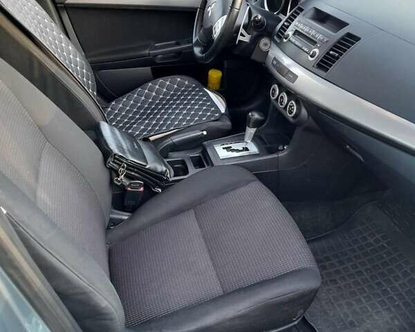 Сірий Міцубісі Lancer, об'ємом двигуна 2 л та пробігом 167 тис. км за 7100 $, фото 8 на Automoto.ua