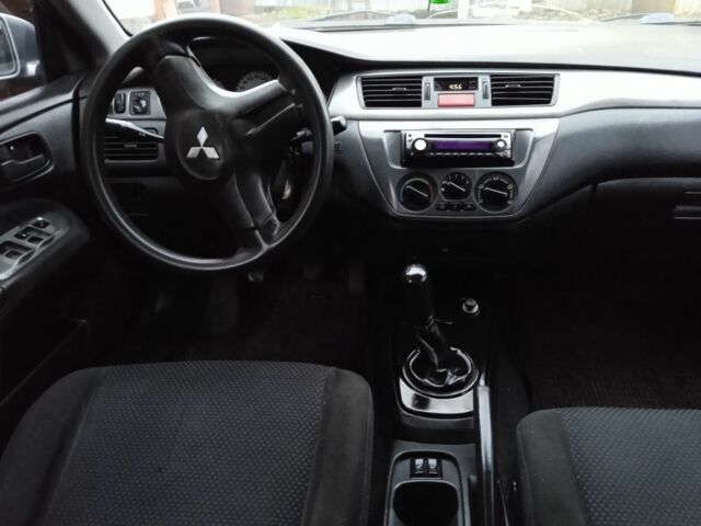 Сірий Міцубісі Lancer, об'ємом двигуна 1 л та пробігом 400 тис. км за 2850 $, фото 7 на Automoto.ua