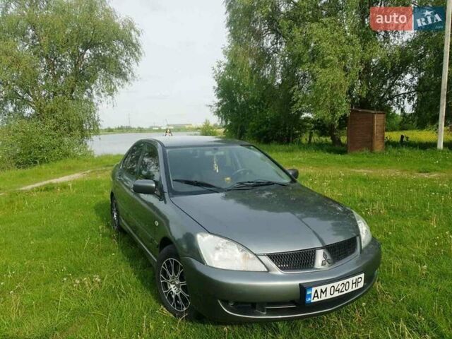 Сірий Міцубісі Lancer, об'ємом двигуна 1.58 л та пробігом 220 тис. км за 4500 $, фото 3 на Automoto.ua