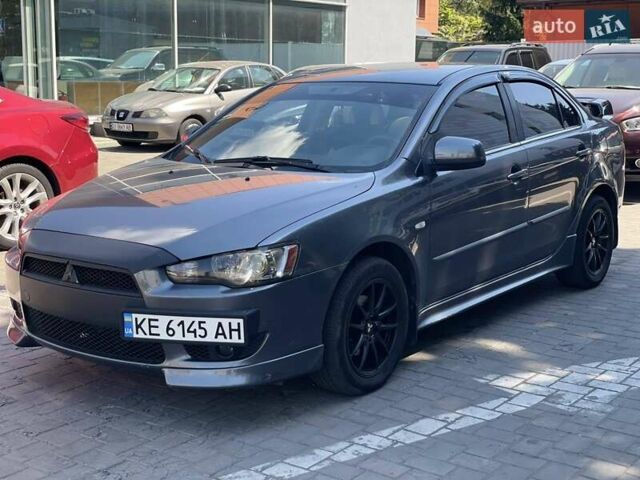 Сірий Міцубісі Lancer, об'ємом двигуна 2 л та пробігом 203 тис. км за 6999 $, фото 7 на Automoto.ua