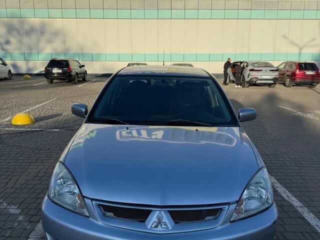 Сірий Міцубісі Lancer, об'ємом двигуна 1.6 л та пробігом 174 тис. км за 4800 $, фото 2 на Automoto.ua