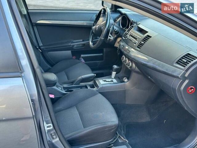 Сірий Міцубісі Lancer, об'ємом двигуна 2 л та пробігом 242 тис. км за 6300 $, фото 4 на Automoto.ua