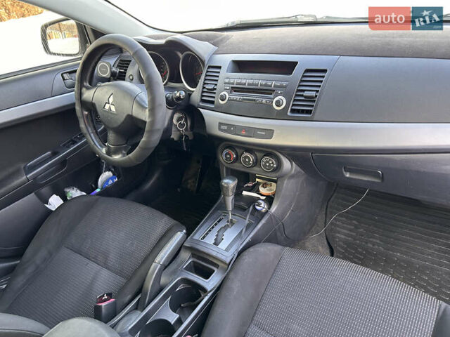Сірий Міцубісі Lancer, об'ємом двигуна 1.5 л та пробігом 261 тис. км за 6200 $, фото 12 на Automoto.ua