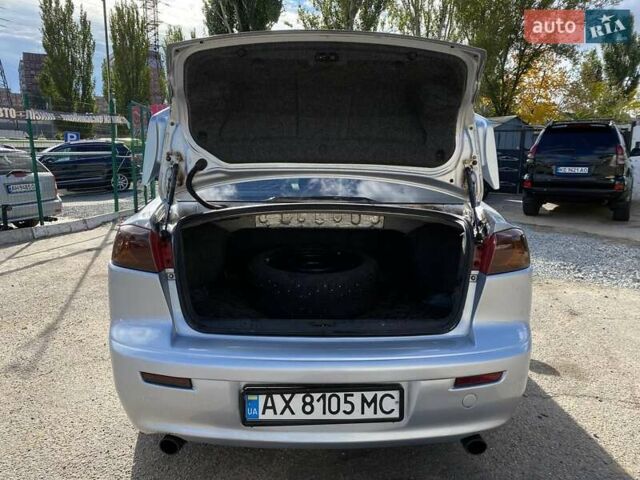 Серый Мицубиси Лансер, объемом двигателя 2 л и пробегом 150 тыс. км за 6100 $, фото 13 на Automoto.ua