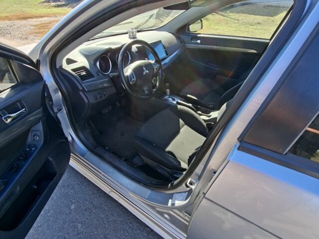 Серый Мицубиси Лансер, объемом двигателя 2 л и пробегом 224 тыс. км за 5500 $, фото 5 на Automoto.ua