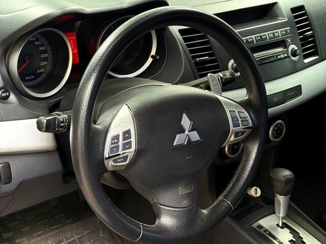 Мицубиси Лансер 2007 в Запорожье на Automoto.ua Серый Мицубиси Лансер, объемом двигателя 2 л и пробегом 187 тыс. км за 5950 $, фото 7 на Automoto.ua