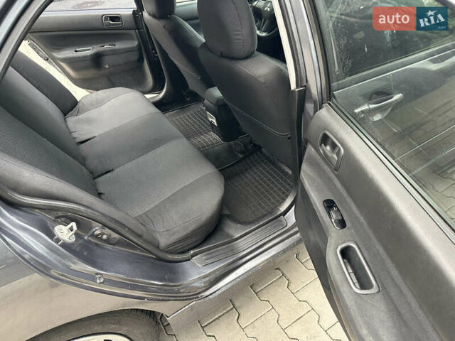 Сірий Міцубісі Lancer, об'ємом двигуна 1.6 л та пробігом 115 тис. км за 2800 $, фото 17 на Automoto.ua