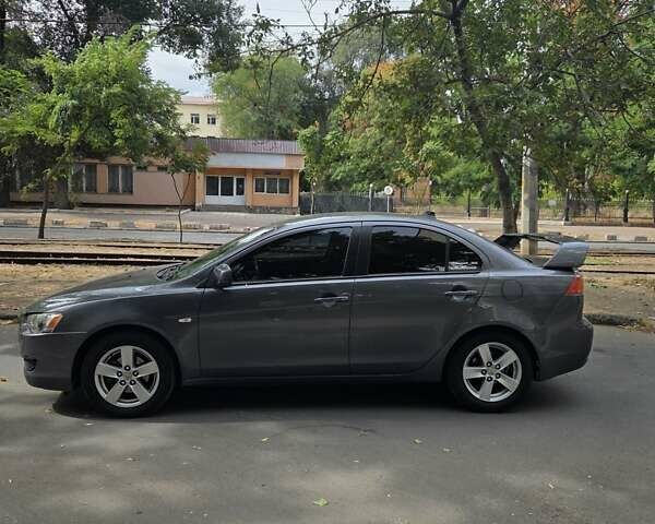 Сірий Міцубісі Lancer, об'ємом двигуна 2 л та пробігом 190 тис. км за 7100 $, фото 6 на Automoto.ua