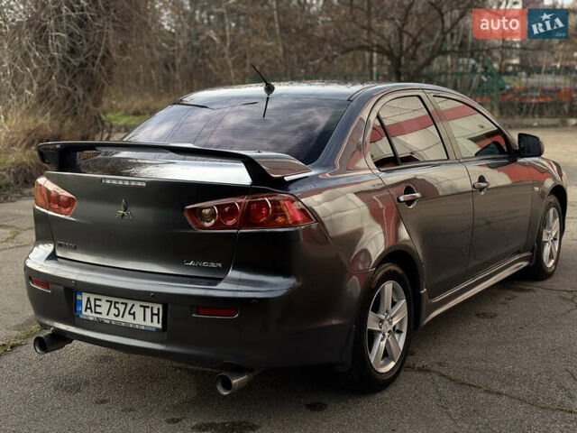 Сірий Міцубісі Lancer, об'ємом двигуна 2 л та пробігом 220 тис. км за 6800 $, фото 2 на Automoto.ua
