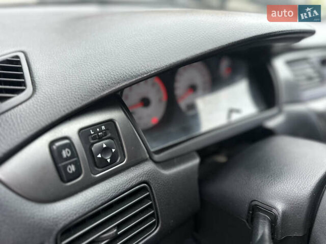 Сірий Міцубісі Lancer, об'ємом двигуна 1.6 л та пробігом 177 тис. км за 2800 $, фото 21 на Automoto.ua