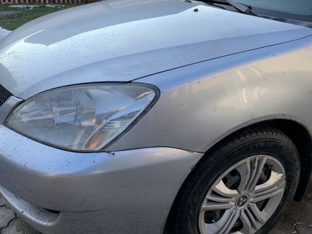 Сірий Міцубісі Lancer, об'ємом двигуна 1.6 л та пробігом 248 тис. км за 3000 $, фото 2 на Automoto.ua