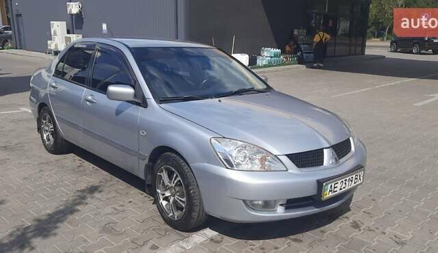 Серый Мицубиси Лансер, объемом двигателя 1.6 л и пробегом 420 тыс. км за 4900 $, фото 5 на Automoto.ua