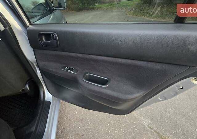 Сірий Міцубісі Lancer, об'ємом двигуна 1.6 л та пробігом 213 тис. км за 3600 $, фото 29 на Automoto.ua