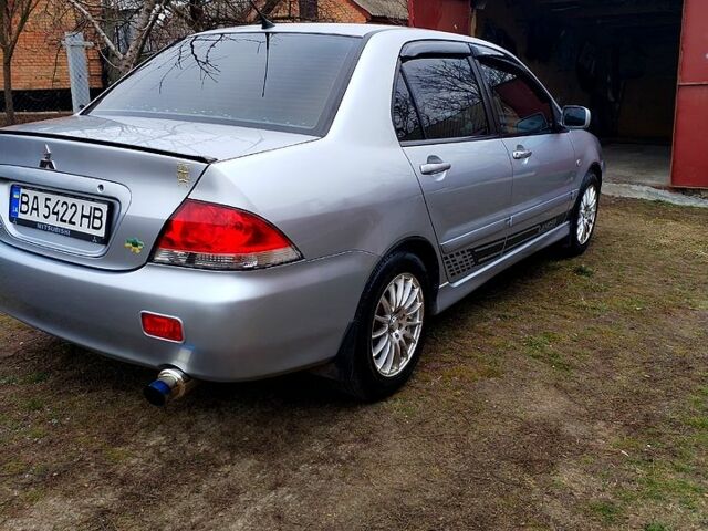 Сірий Міцубісі Lancer, об'ємом двигуна 1.6 л та пробігом 280 тис. км за 4800 $, фото 6 на Automoto.ua