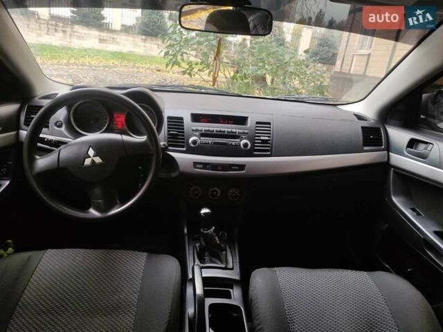 Сірий Міцубісі Lancer, об'ємом двигуна 1.5 л та пробігом 196 тис. км за 5600 $, фото 8 на Automoto.ua