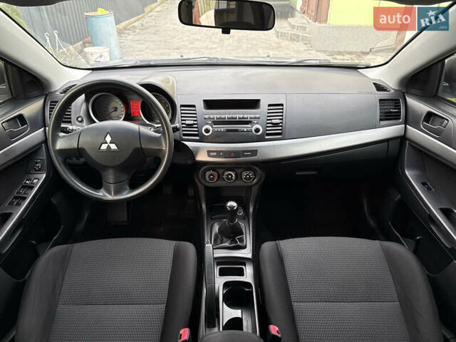 Міцубісі Lancer 2007 у Житомирі на Automoto.ua Сірий Міцубісі Lancer, об'ємом двигуна 1.5 л та пробігом 195 тис. км за 5700 $, фото 5 на Automoto.ua