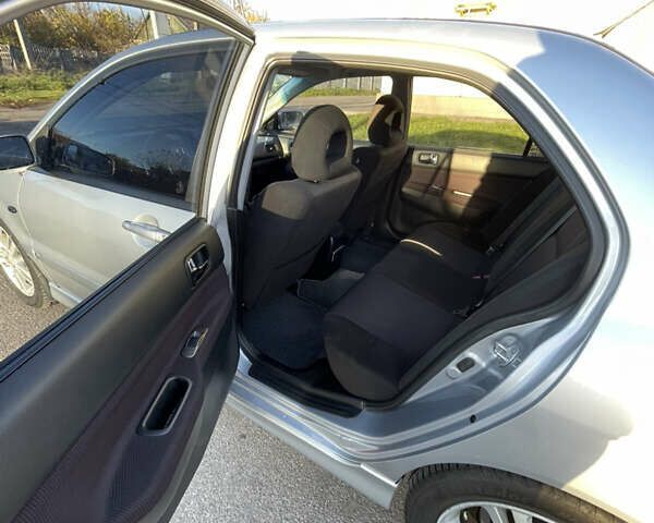 Мицубиси Лансер 2007 в Василькове на Automoto.ua Серый Мицубиси Лансер, объемом двигателя 2 л и пробегом 177 тыс. км за 5399 $, фото 11 на Automoto.ua