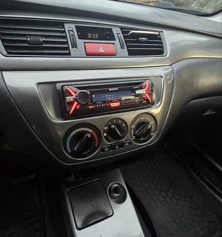 Сірий Міцубісі Lancer, об'ємом двигуна 1.6 л та пробігом 213 тис. км за 3600 $, фото 14 на Automoto.ua