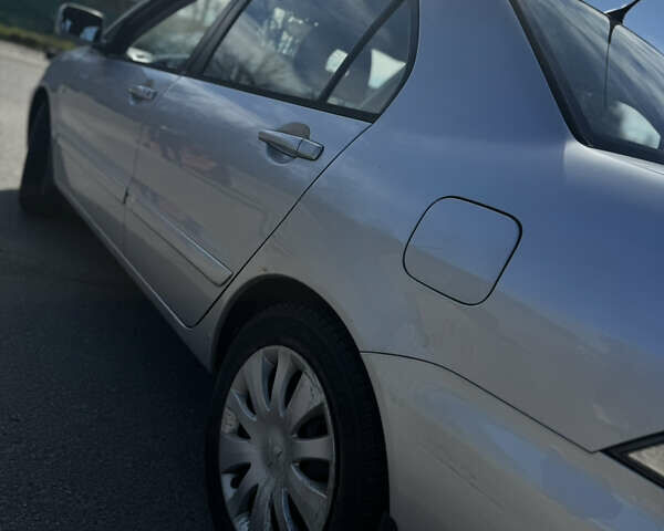 Серый Мицубиси Лансер, объемом двигателя 1.58 л и пробегом 261 тыс. км за 4500 $, фото 10 на Automoto.ua