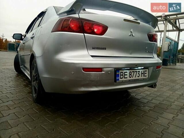 Сірий Міцубісі Lancer, об'ємом двигуна 2 л та пробігом 268 тис. км за 5555 $, фото 5 на Automoto.ua