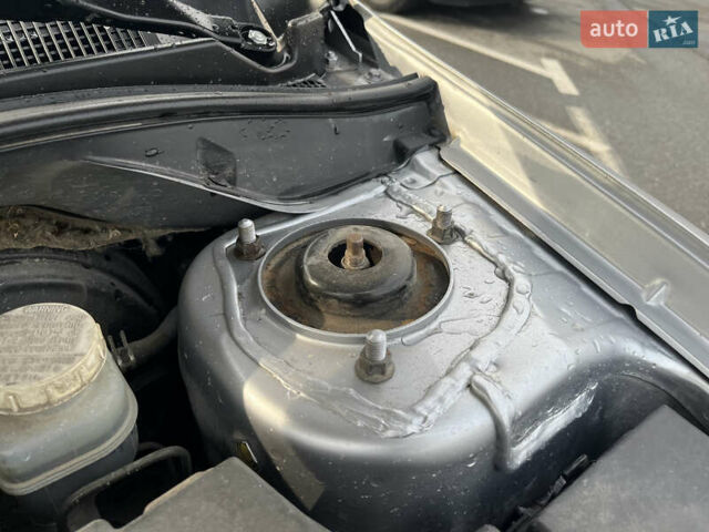 Серый Мицубиси Лансер, объемом двигателя 1.58 л и пробегом 232 тыс. км за 4900 $, фото 32 на Automoto.ua