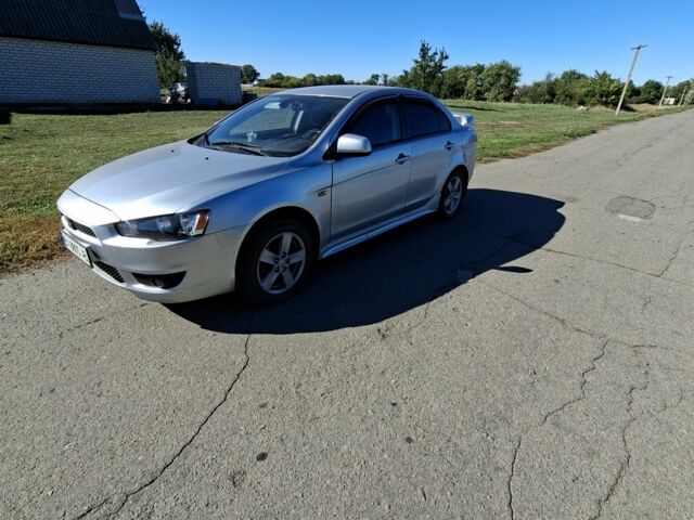 Серый Мицубиси Лансер, объемом двигателя 2 л и пробегом 224 тыс. км за 5500 $, фото 3 на Automoto.ua