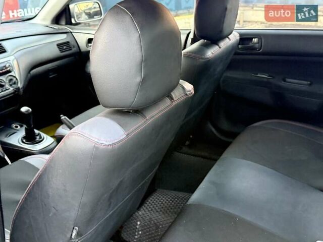 Сірий Міцубісі Lancer, об'ємом двигуна 1.6 л та пробігом 395 тис. км за 4900 $, фото 32 на Automoto.ua
