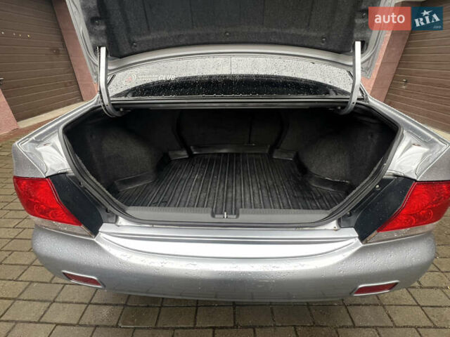 Серый Мицубиси Лансер, объемом двигателя 1.6 л и пробегом 254 тыс. км за 4500 $, фото 9 на Automoto.ua