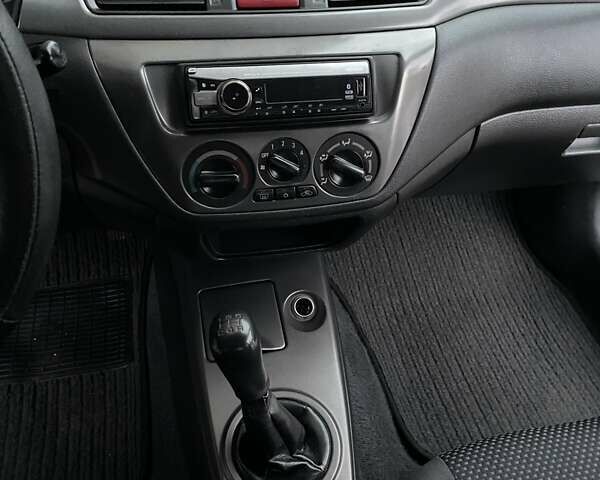 Сірий Міцубісі Lancer, об'ємом двигуна 1.6 л та пробігом 330 тис. км за 3500 $, фото 11 на Automoto.ua