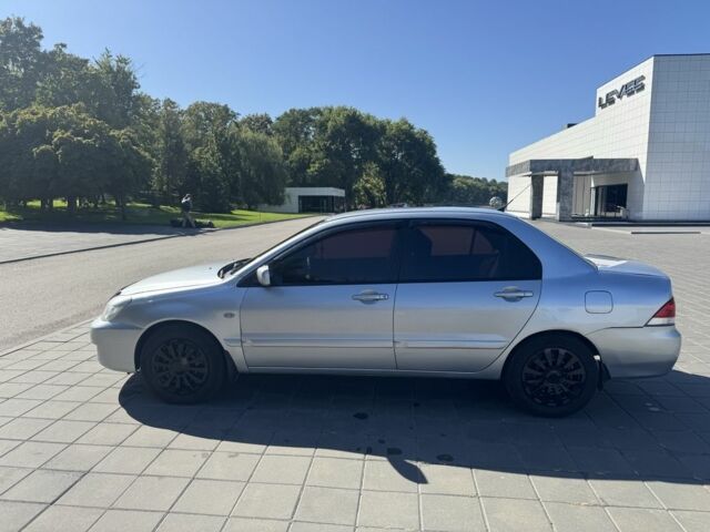 Серый Мицубиси Лансер, объемом двигателя 1.6 л и пробегом 265 тыс. км за 4100 $, фото 6 на Automoto.ua