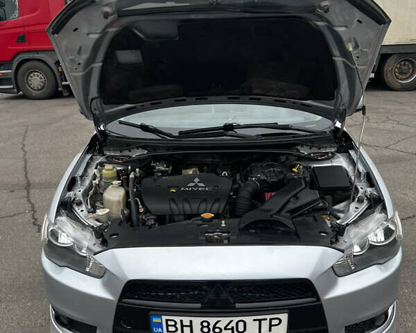 Серый Мицубиси Лансер, объемом двигателя 2 л и пробегом 286 тыс. км за 5800 $, фото 6 на Automoto.ua