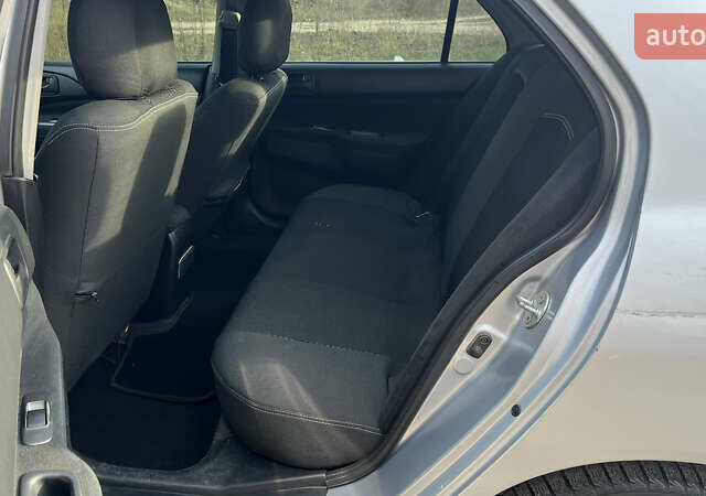 Серый Мицубиси Лансер, объемом двигателя 1.58 л и пробегом 290 тыс. км за 3750 $, фото 9 на Automoto.ua