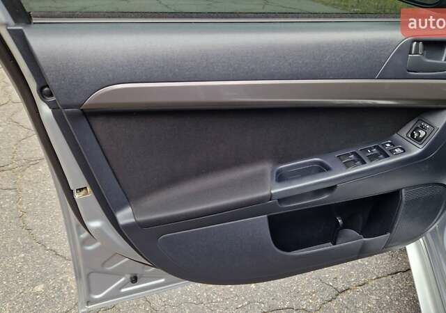 Серый Мицубиси Лансер, объемом двигателя 2 л и пробегом 213 тыс. км за 6550 $, фото 10 на Automoto.ua